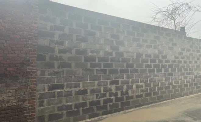 Société Nouvelle Loubert réalisation d'un mur en parpaings dans une maison proche de Roubaix